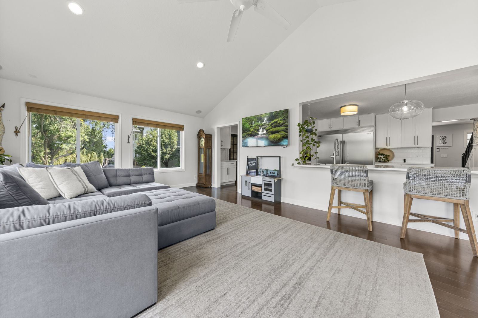 Living room adjoining kitchen with open concept layout