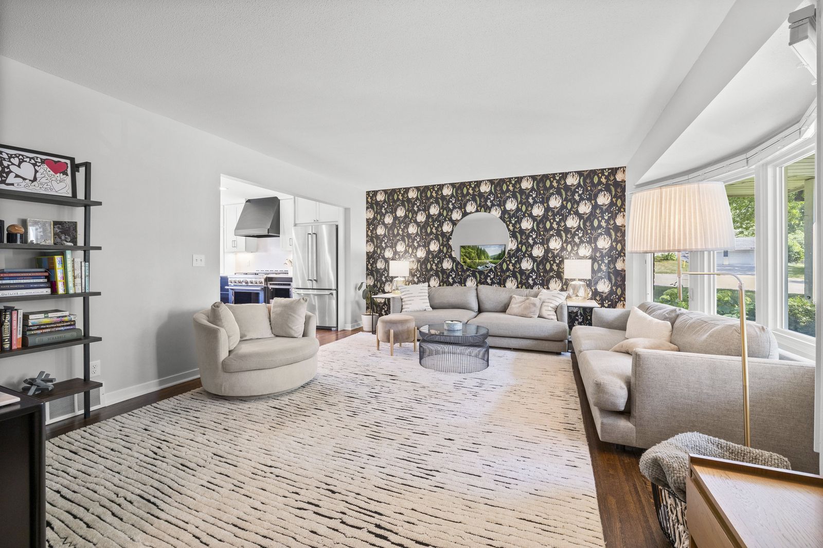 Living room alternate view, virtually staged with sofas