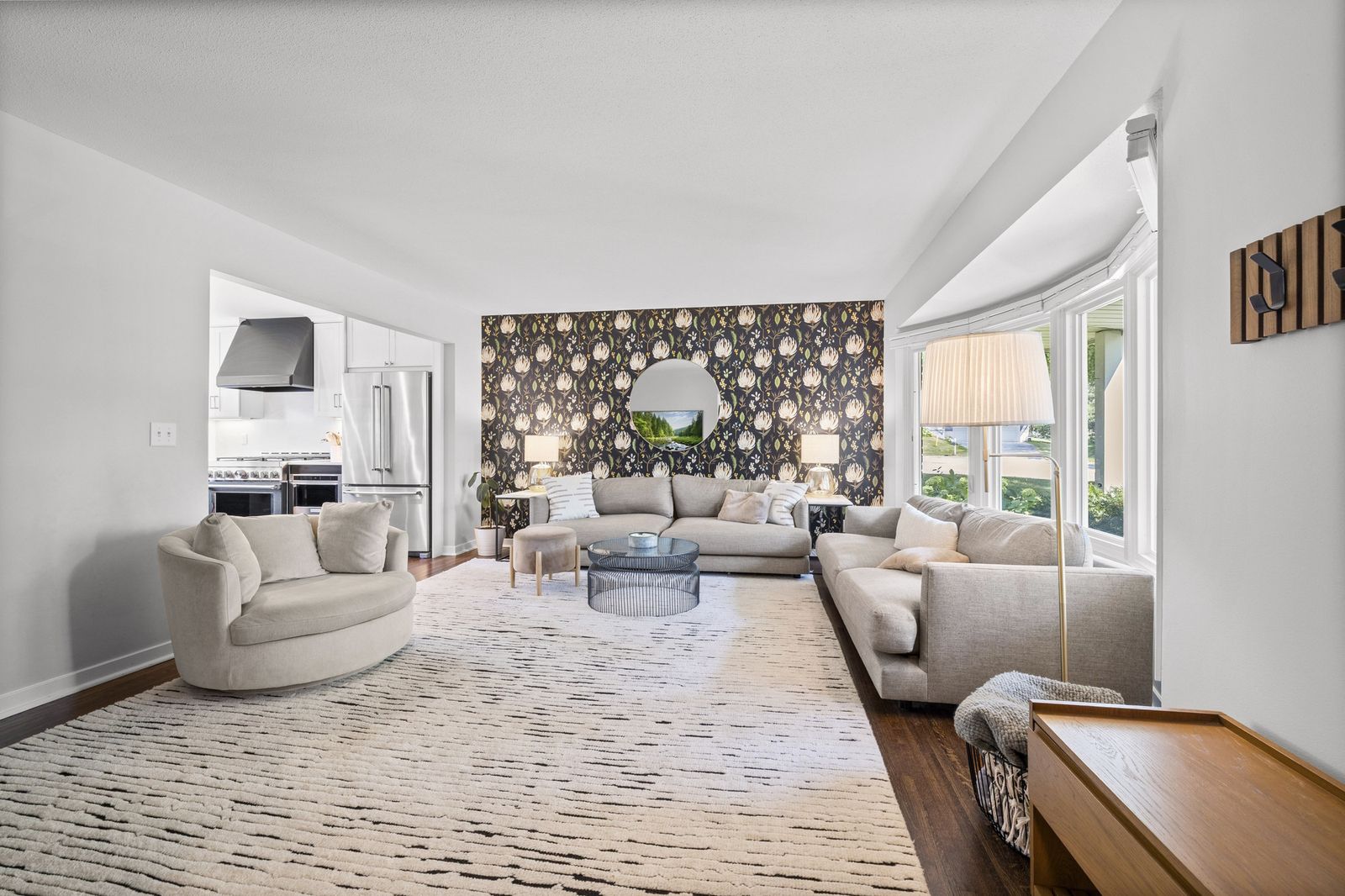 Living room with fireplace, virtually staged with seating