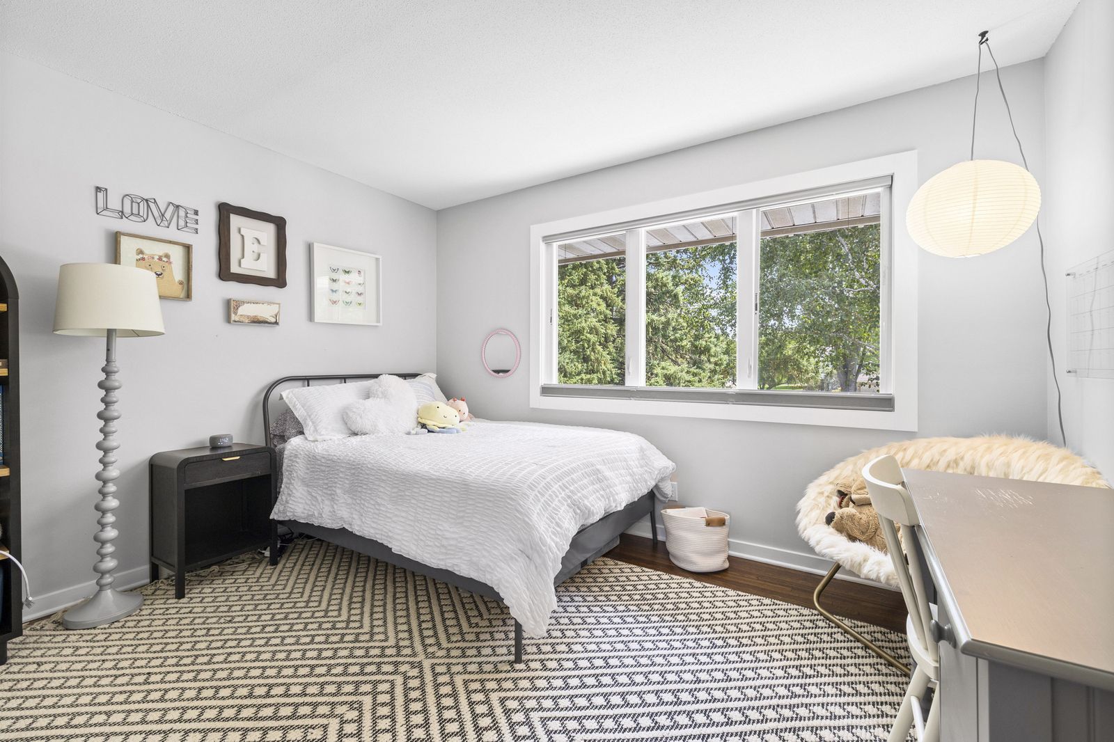 Bedroom with desk and window seating