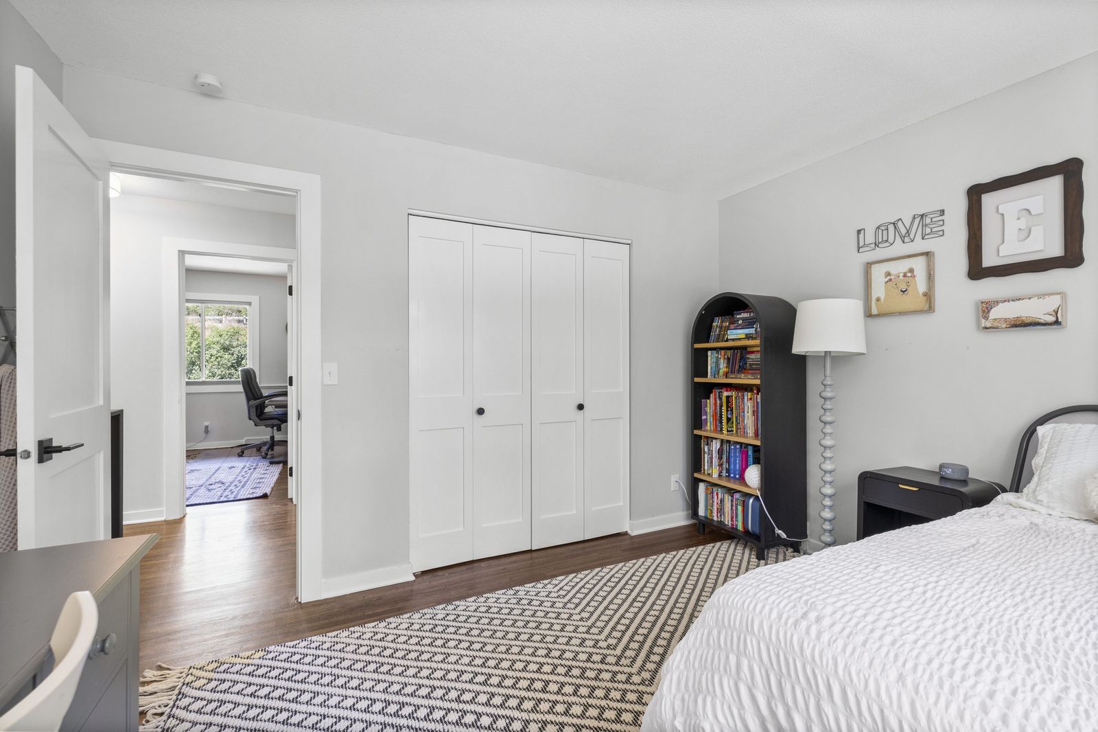 Bedroom with closets and hallway view