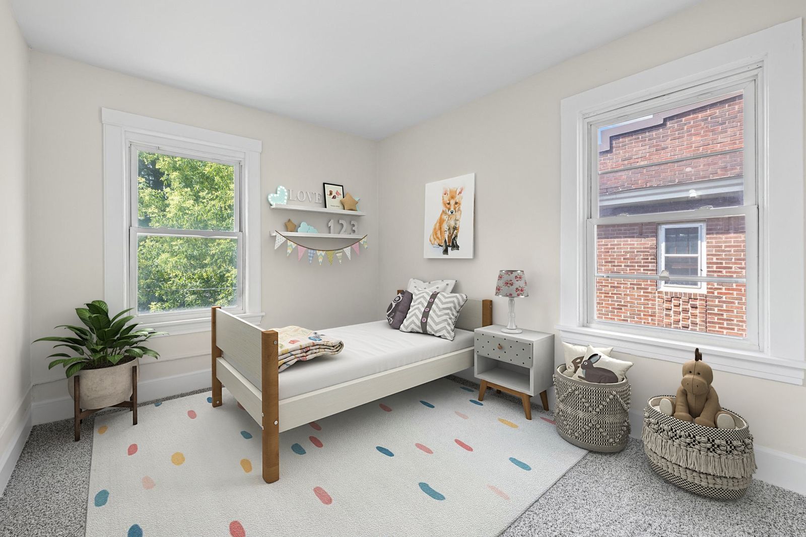 Upstairs bedroom with twin bed and colorful rug