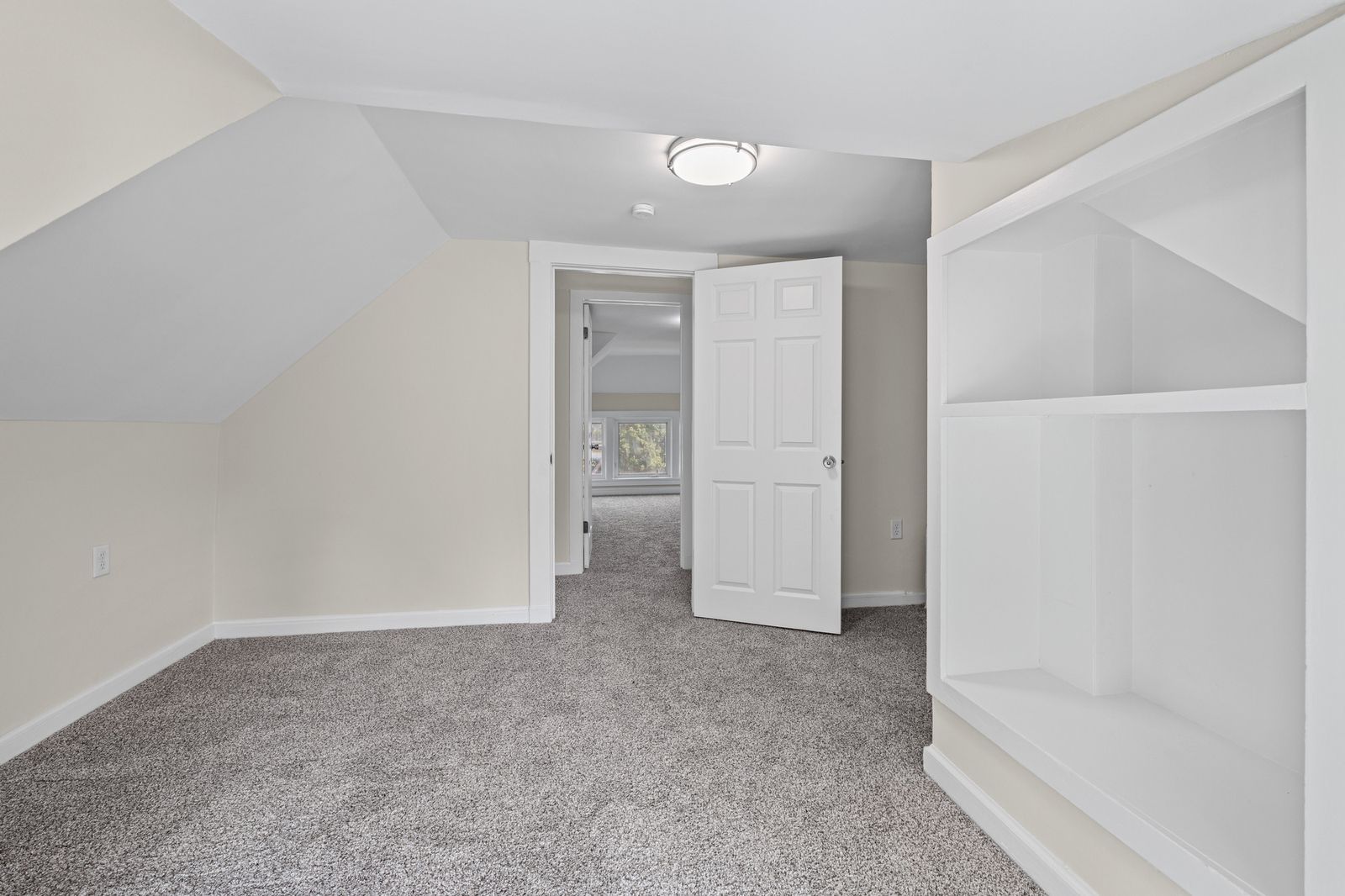 Upstairs hallway with multiple doors