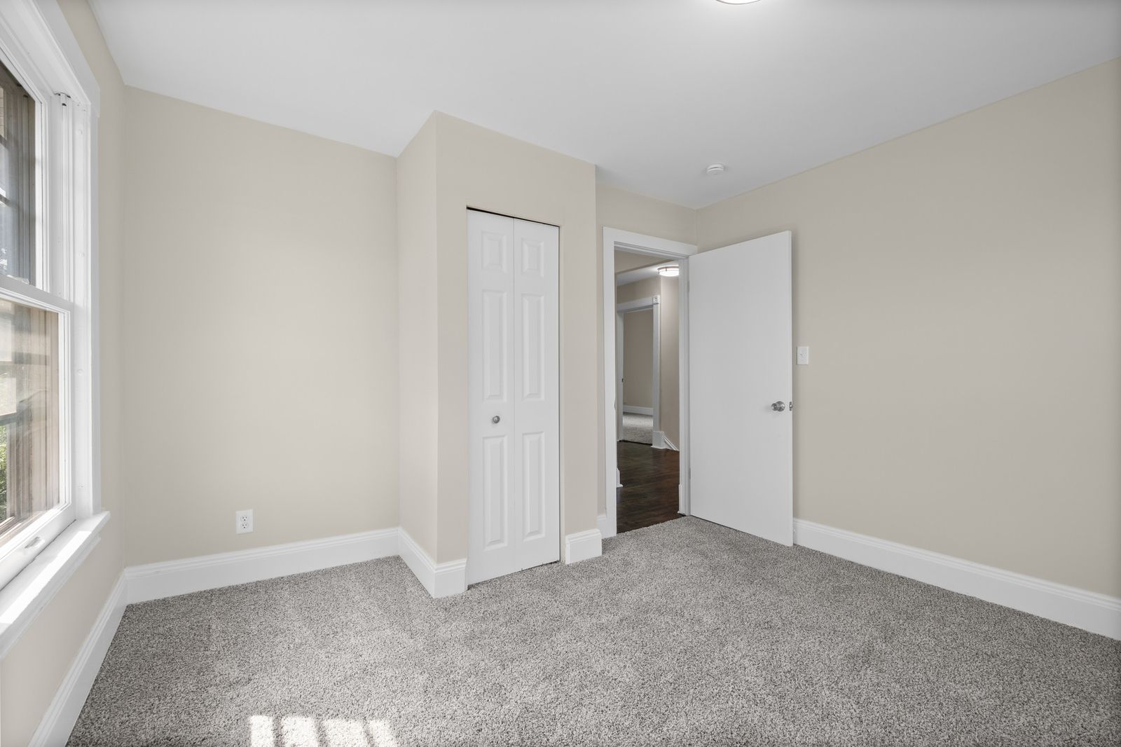 Upstairs room with multiple doors